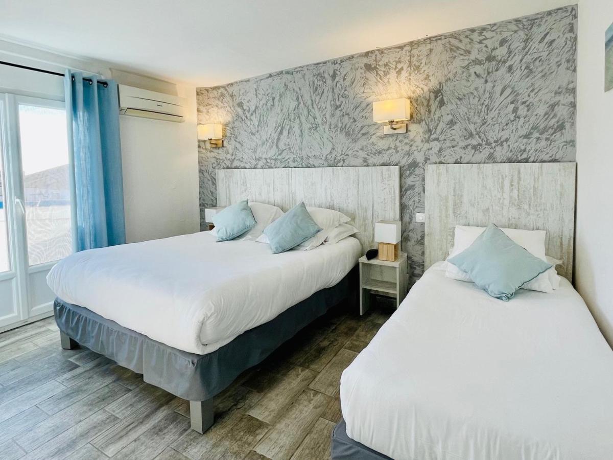 Hotel Les Palmiers En Camargue แซ็งต์-มารี-เดอ-ลา-แมร์ ภายนอก รูปภาพ